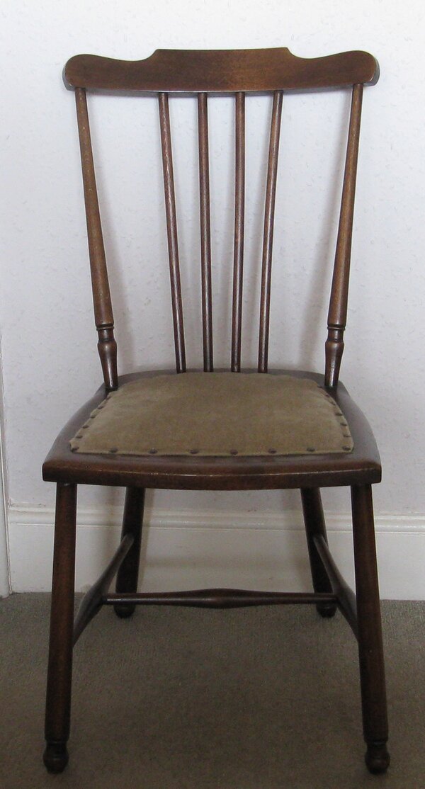 Small antique wooden bedroom chair with green seat