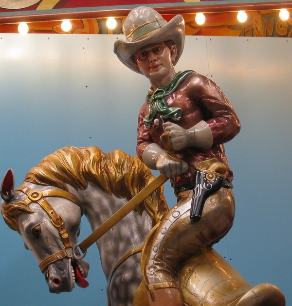 Fairground wooden cowboy and horse facing left