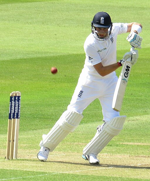 Joe Root batting, looking riht. Stumps to left.