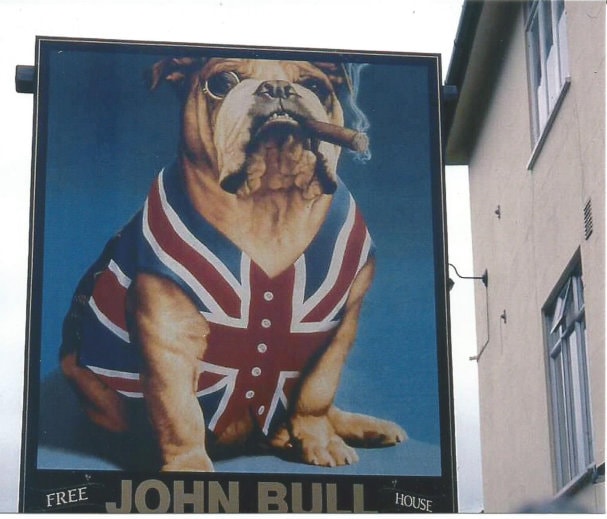 Pub sign. Bulldog in Union Flag waistcoat with cigar.